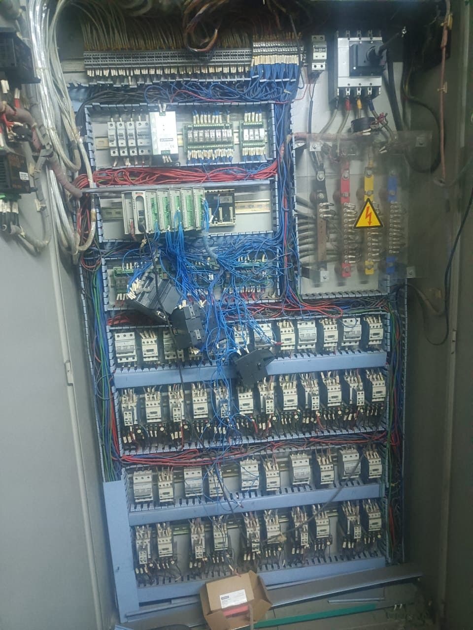 Open electrical distribution panel with organised MCBs and wiring installed by VRC Electrical